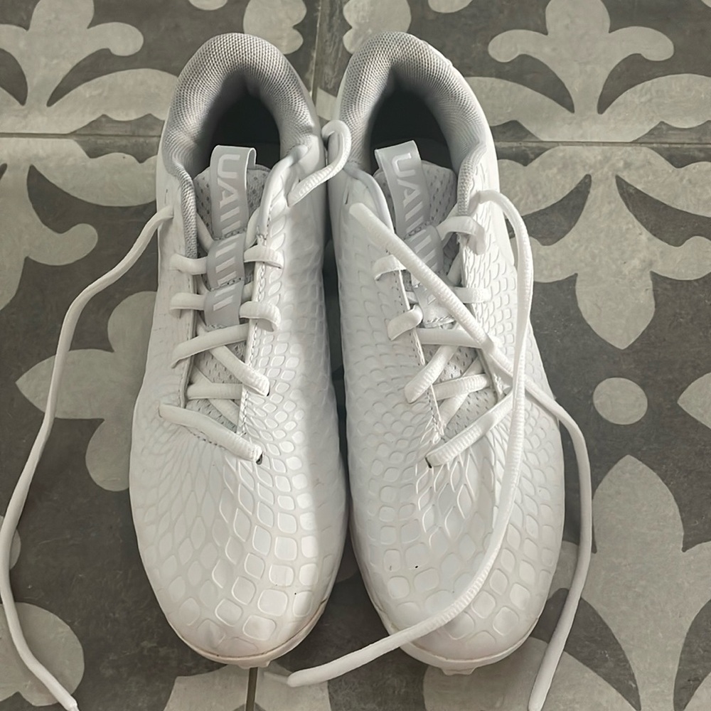 Girls softball cleats. Worn to one practice.